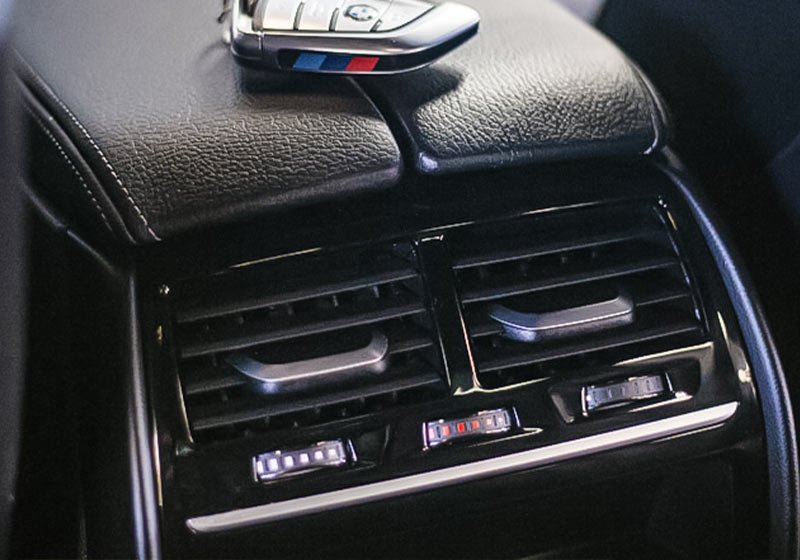 orange holden with bonnet open