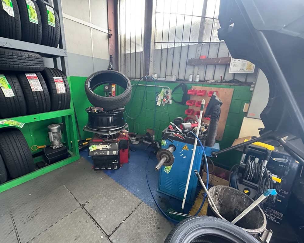 orange holden with bonnet open